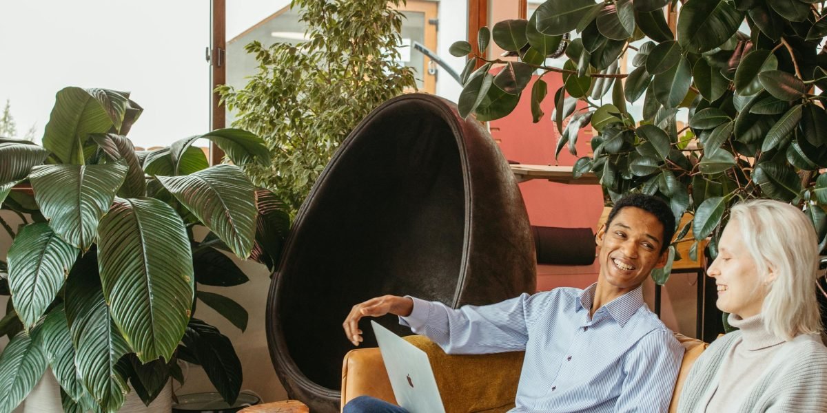 Expats or digital nomads collaborating and working in a modern, dynamic co-working environment.