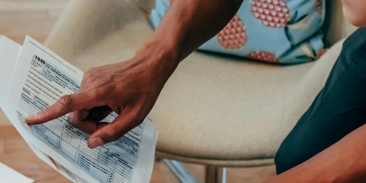An investor carefully reviewing market data to make informed real estate decisions.