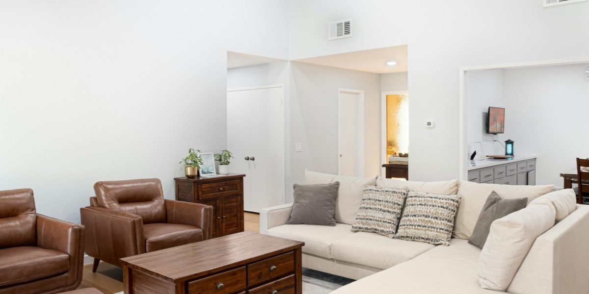 A family enjoying the comforts and spaciousness of a modern home setting.