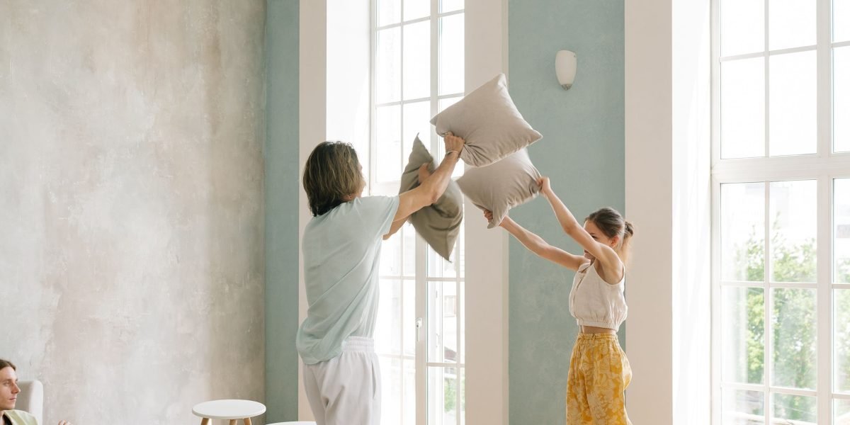 A family enjoying the spaciousness and comfort of a serviced apartment in Dubai.