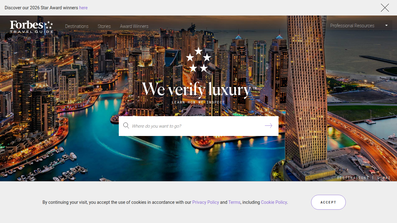 Screenshot of the Forbes Travel Guide homepage, a recognized authority for rating luxury hotels and resorts worldwide.
