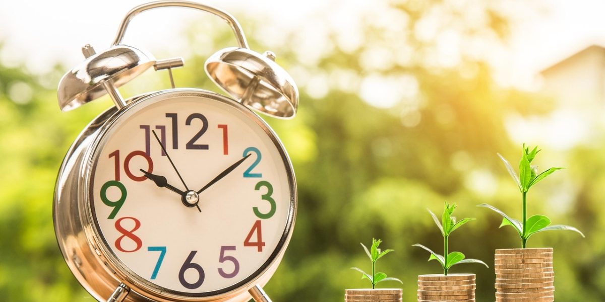 An individual thoughtfully considering financial investment opportunities in real estate.