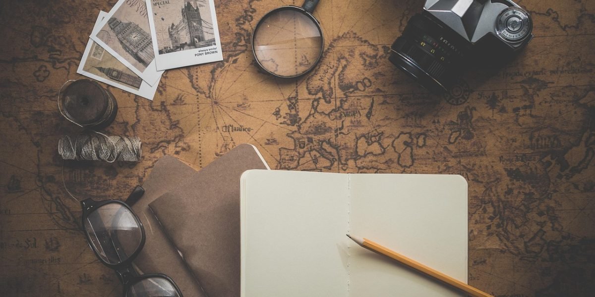 A diverse group of friends or family collaborating on travel plans, emphasizing culturally specific needs.