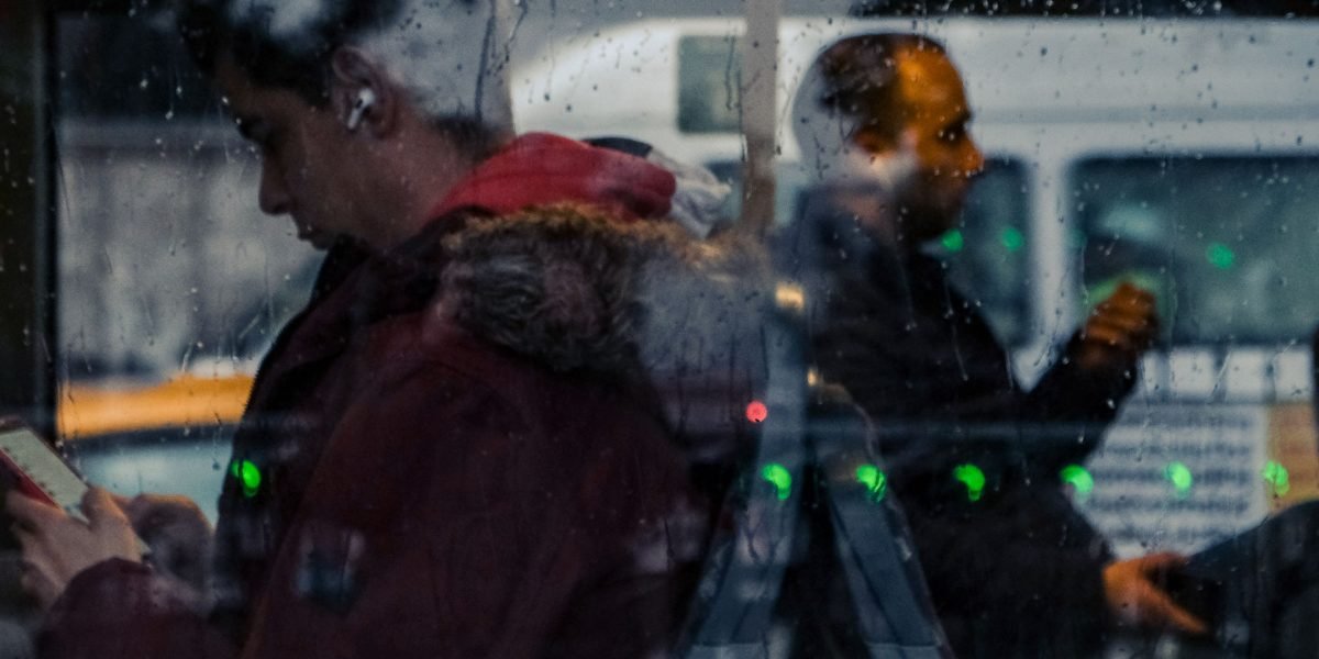 People moving through a city's public transport system, highlighting accessibility and ease of travel.