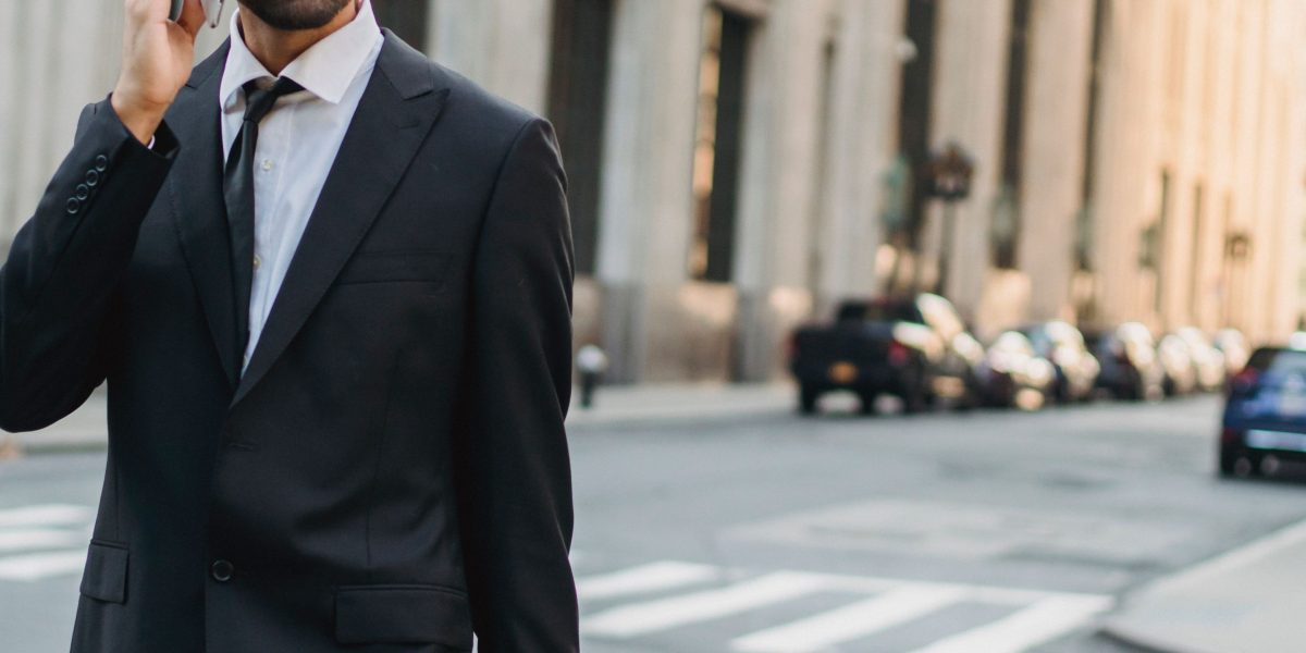 A business professional navigating a bustling city, emphasizing convenience and accessibility.