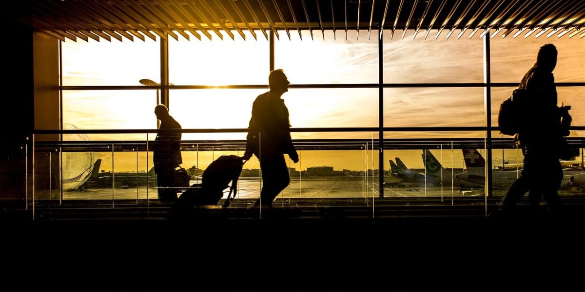 A traveler confidently navigating a modern airport, ready to explore Dubai.