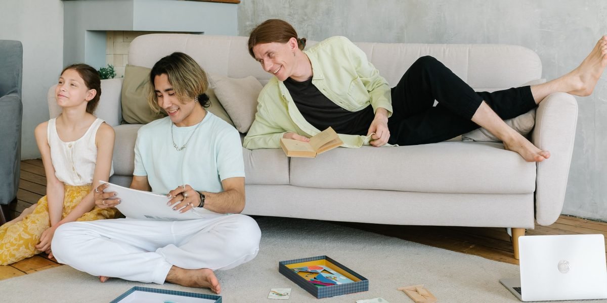 A family enjoying a comfortable, spacious living area, highlighting the 'home away from home' feel of serviced apartments.